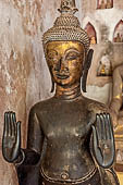 Vientiane, Laos - Wat Si Saket, The gallery around the sim houses thousands of Buddha statues in various mudras, dating  from the 16th century.